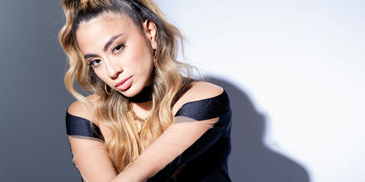 Multi-platinum singer-songwriter Ally Brooke lets the light shine with new all-spanish single and video "Mi Música"